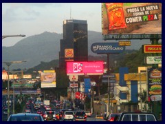 West San Salvador 07 - Torre Cuscatlan and signs